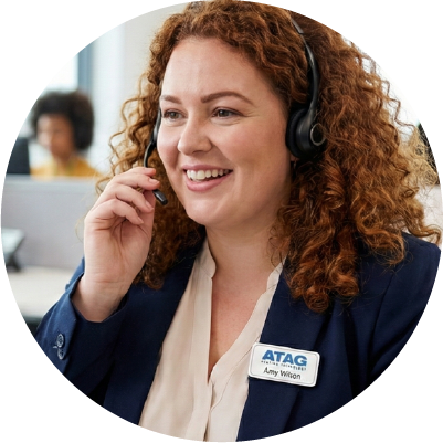 Image of a smiling woman in a call centre 